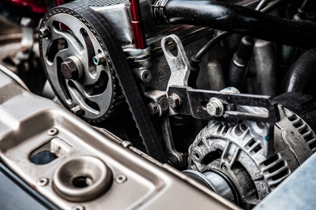 High-resolution close-up of a car engine showing intricate mechanical parts and metallic details.